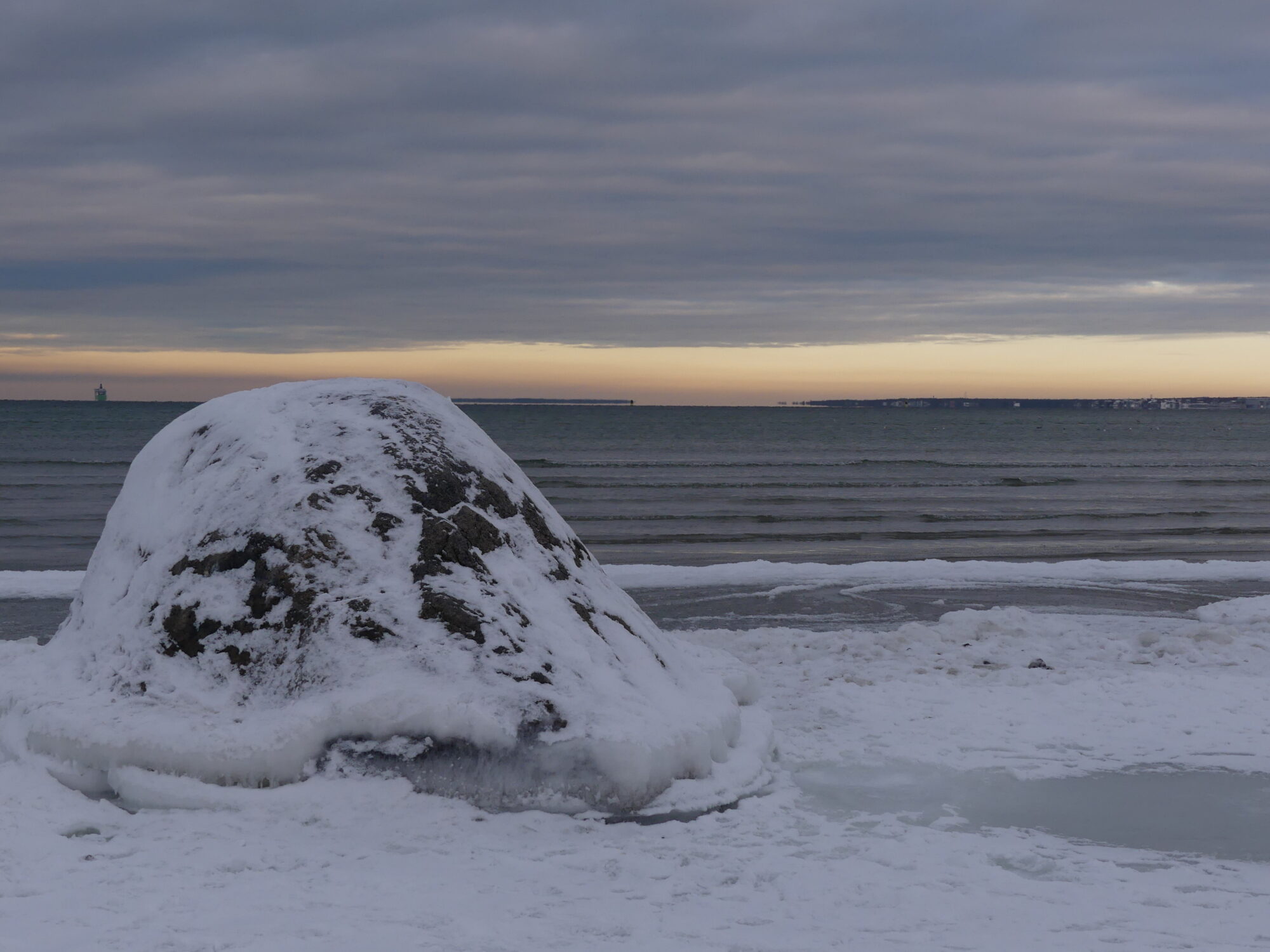 Baltic Sea and its beach covered in snow